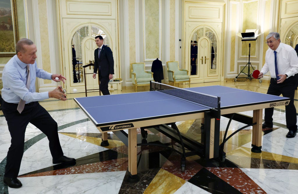 Tokayev (right) and Turkish President Recep Tayyip Erdoğan playing table tennis during a visit by Erdoğan to Kazakhstan last month, which has nothing to do with this story but is just an amazing picture (Turkish Presidency / Murat Cetinmuhurdar / Handout / Anadolu Agency via Getty Images)