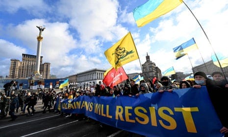 protest in central Kyiv with banner: 'Ukrainians will resist'