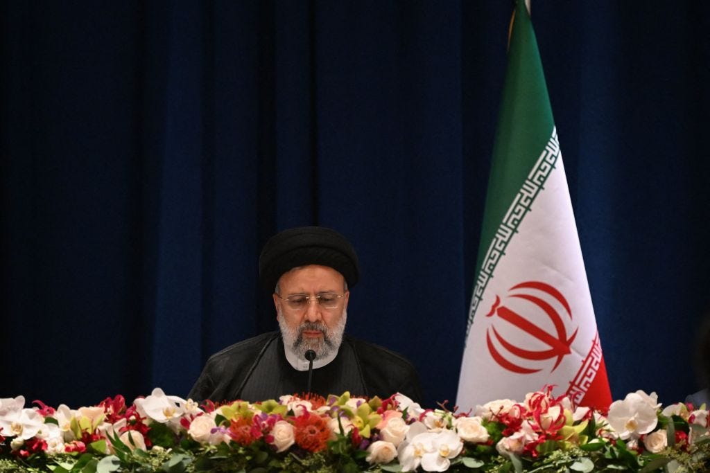 Raisi speaking to reporters at the United Nations on Thursday (ED JONES/AFP via Getty Images)