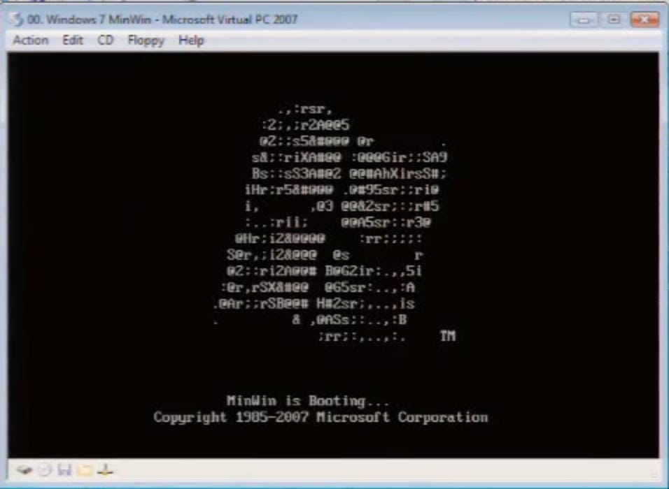 A command window showing MinWin booting. The boot screen is all characters with a Windows flag made out of ASCII art. The text is "MinWin is Booting, copyright Microsoft 1985-2007
