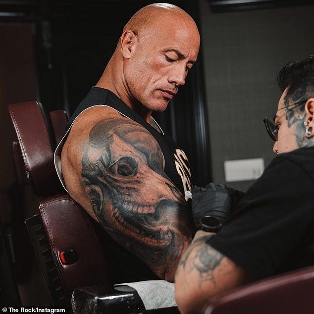 Dwayne Johnson gives update on his massive arm tattoo of a bull that he has  been enhancing - Geeky Craze