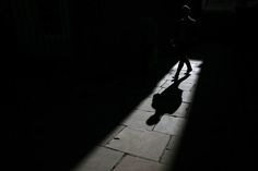 An A1 poster sized print, approx 23"x33" (841x594mm). A man casts a shadow as he walks along an alleyway in central London, Britain October 3, 2016. REUTERS/Stefan Wermuth - LR1ECA3107QLK. . Image supplied by Reuters Images. Product ID:19262191_80444_0