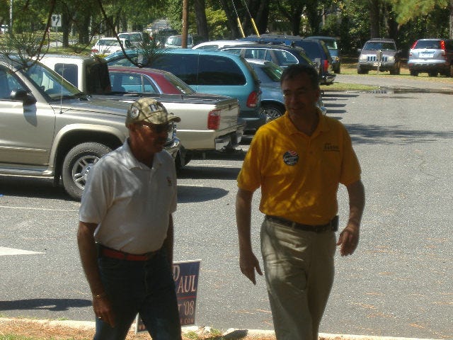 Harris and Wicomico County Republican chair Dr. John Bartkovich share a conversation.