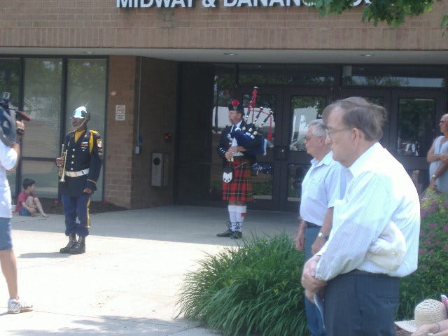 There's just something about a bagpiper playing 'Amazing Grace'. Matthew Wallace is the musician pictured here.