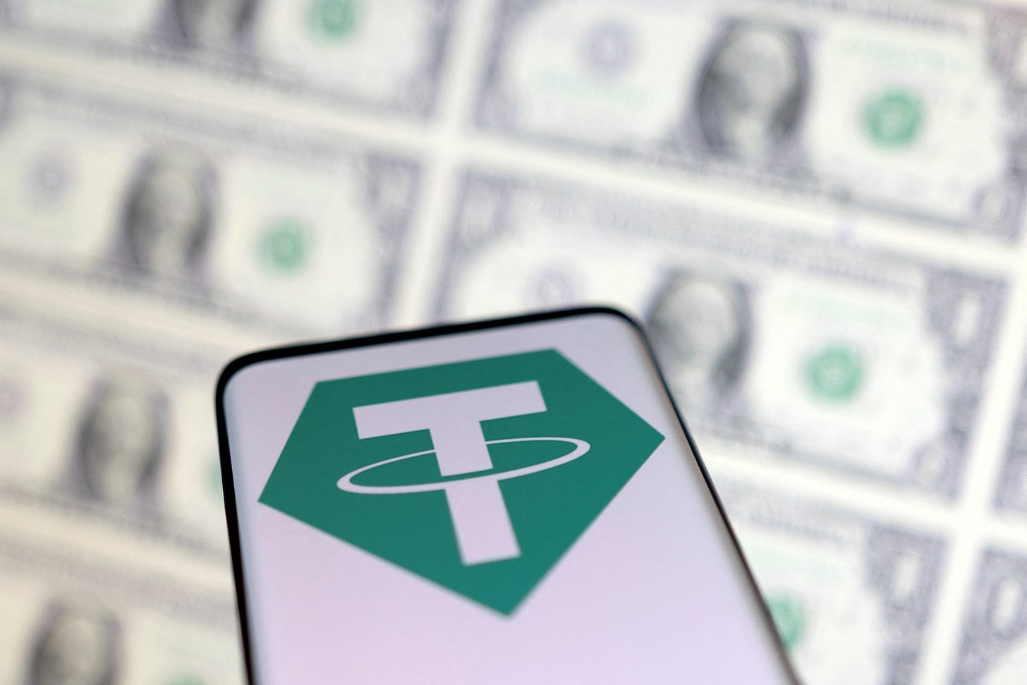 Crypto meltdown deepens as stablecoin Tether drops below dollar peg |  Reuters