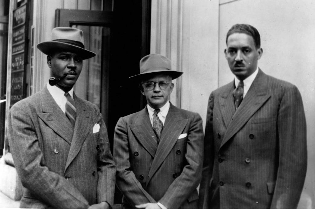 Walter F. White (center) poses with civil rights activist Roy Wilkins (left) and justice Thurgood Marshall.