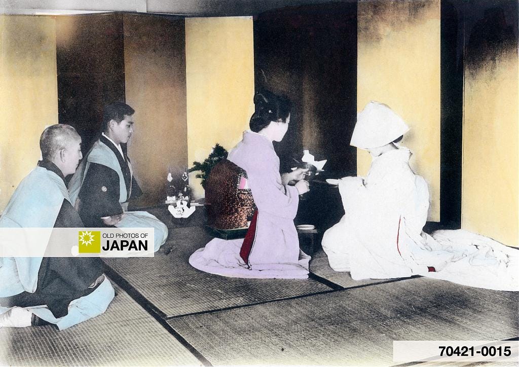 A Japanese bride drinks sake to formalize her marriage, 1905
