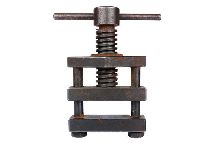 A simple metal screw press. The Gutenberg printing press used a wooden screw press.