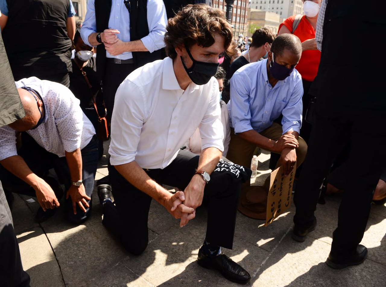 Trudeau takes a knee at anti-racism protest on Parliament Hill | CBC News