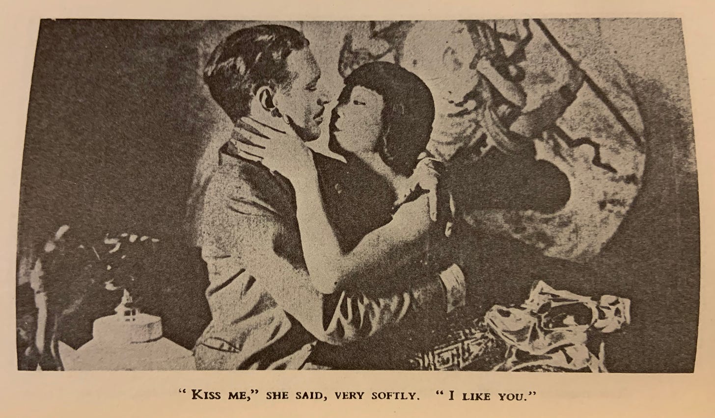 Anna May Wong embraces her co-star, Jameson Thomas, in Piccadilly, circa 1929. Their kiss was filmed but later cut from the final reel.