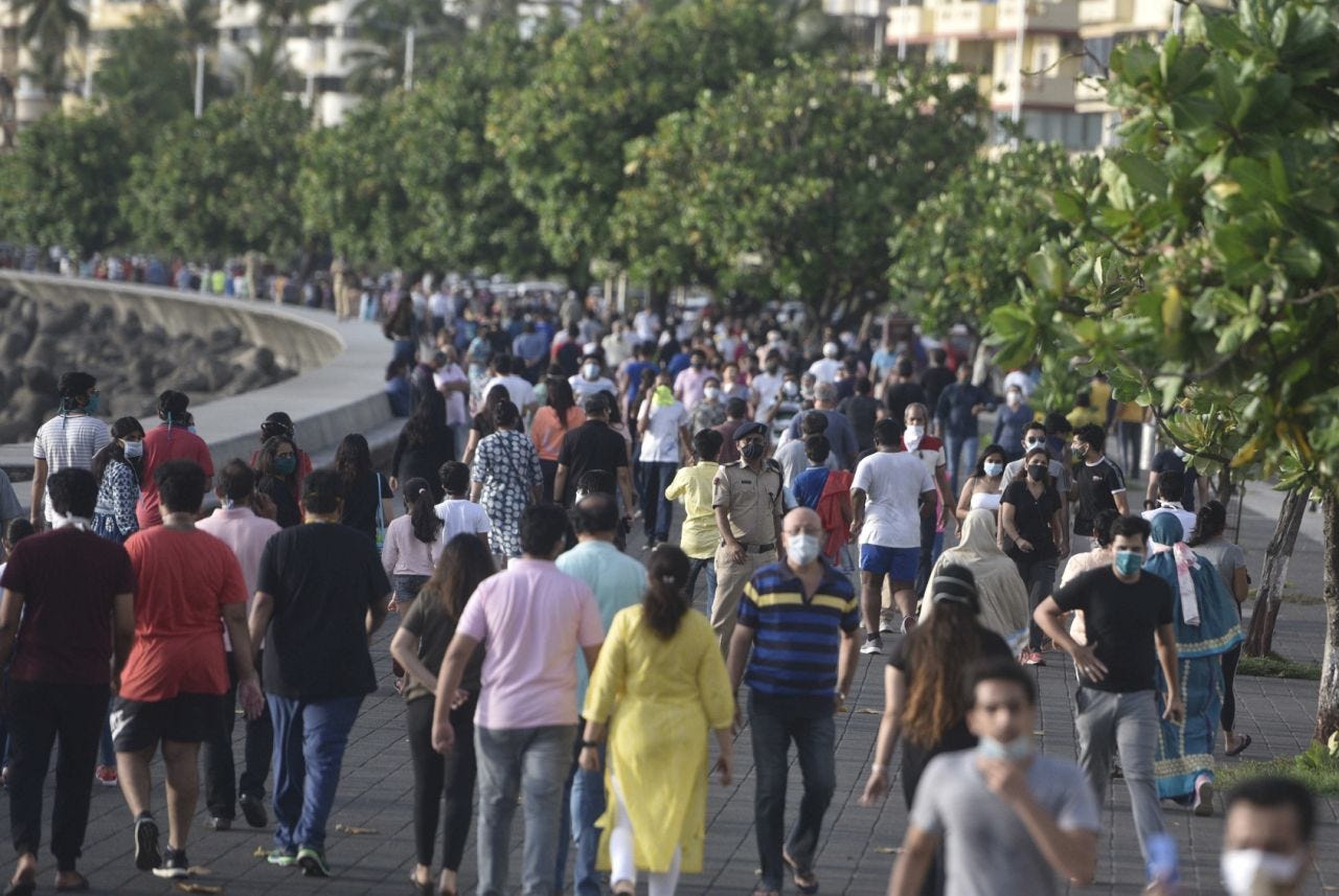 MUMBAI, INDIA - JUNE 7: Huge crowd walks at Marine drive during the first phase of Unlock 1.0, on June 7, 2020 in Mumbai, India. (Photo by Satyabrata Tripathy/Hindustan Times via Getty Images)
