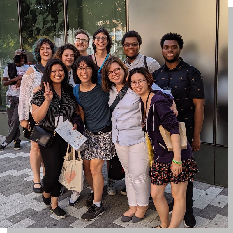 Minnesota group poses on street outside Game Devs of Color in NYC