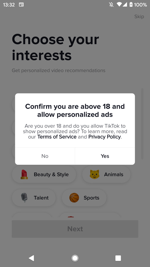 TikTok push notification asking the user to confirm that he or she is over 18 and allows personalized ads