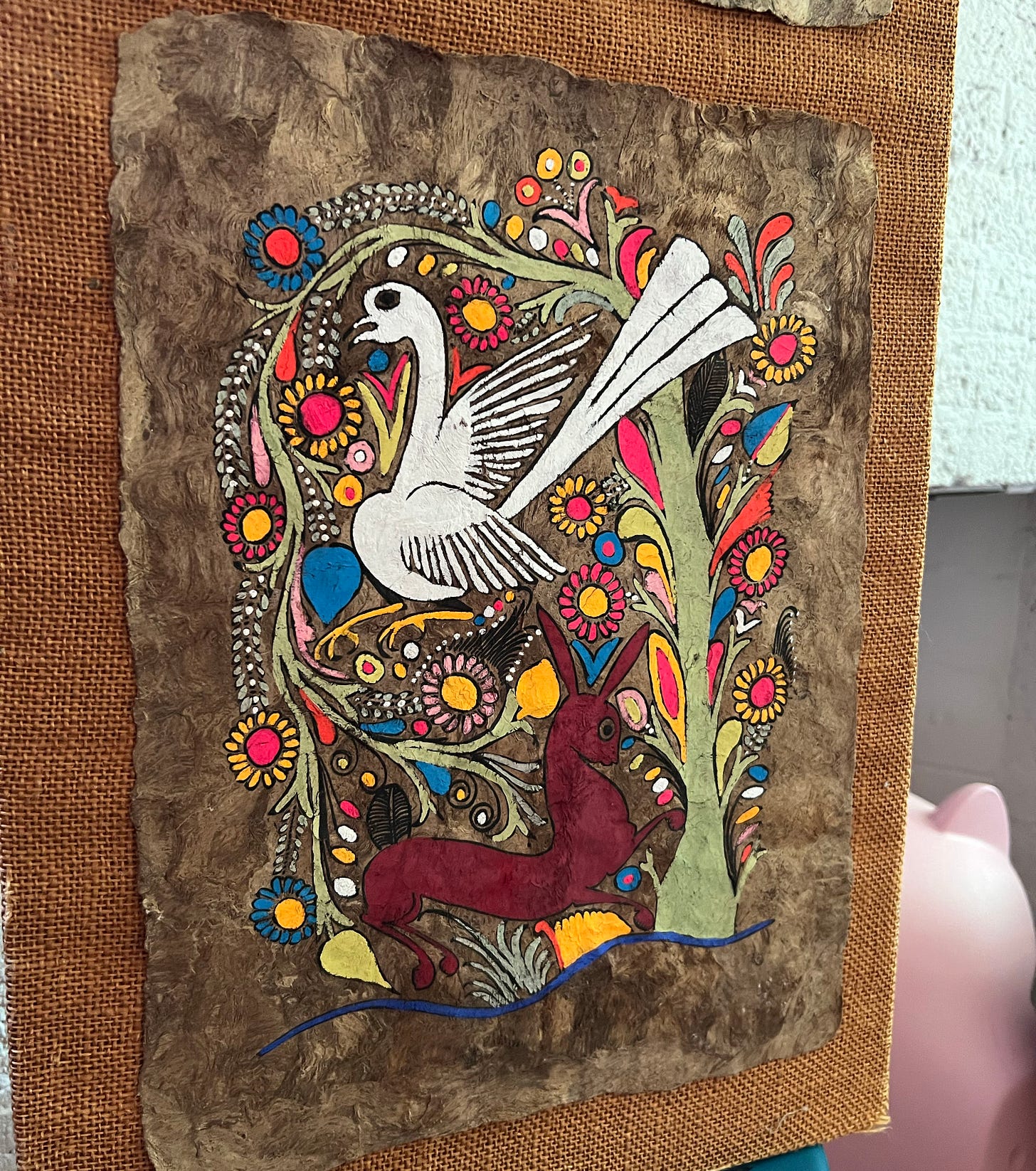 south american folk art painting on bark paper with birds, rabbit, and flowers