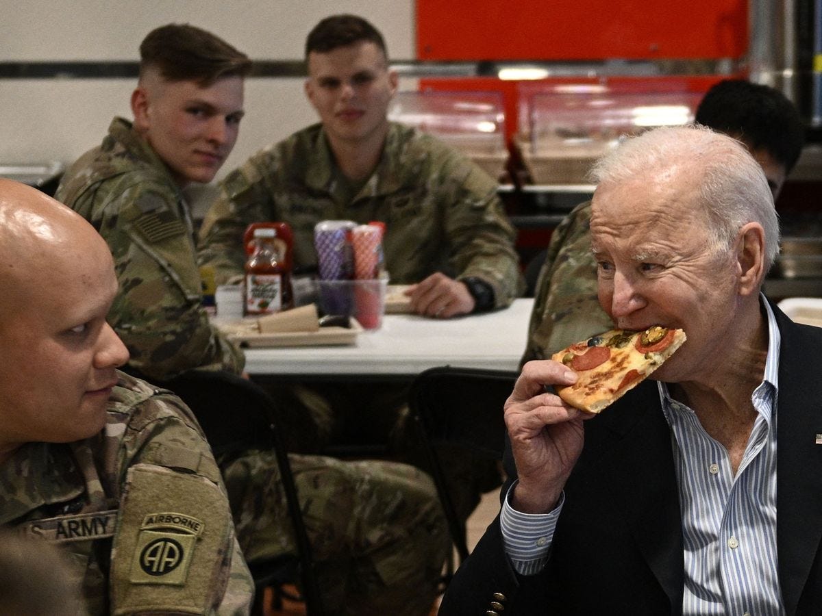Joe Biden scoffs pizza with US troops in Poland but blocked from visiting  Ukraine - Mirror Online