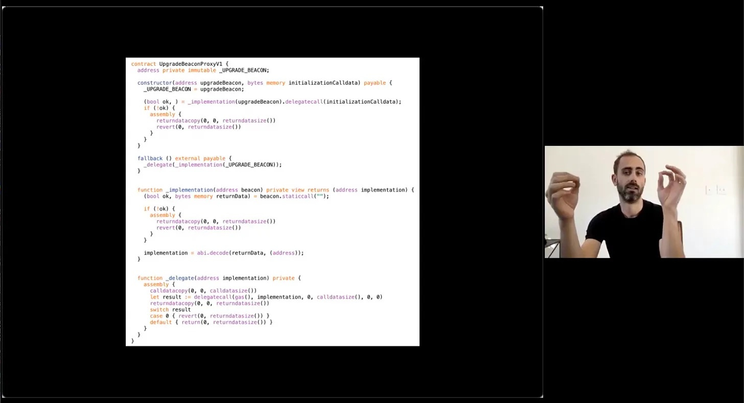 0age giving a talk on smart contract upgradability patterns.