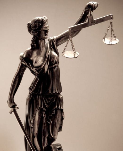 Lady Justice, the Roman Goddess — blindfold first added in the 1500s by a Swiss sculptor, perhaps not unrelated to the timing of the subsequent Enlightenment