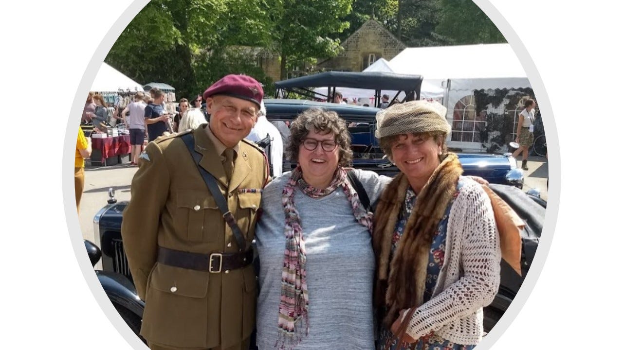 Annette with two people in WWII outfits