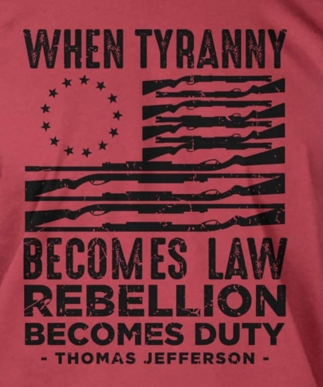 May be an image of text that says 'WHEN TYRANNY BECOMES LAW REBELLION BECOMES DUTY -THOMAS JEFFERSON-'
