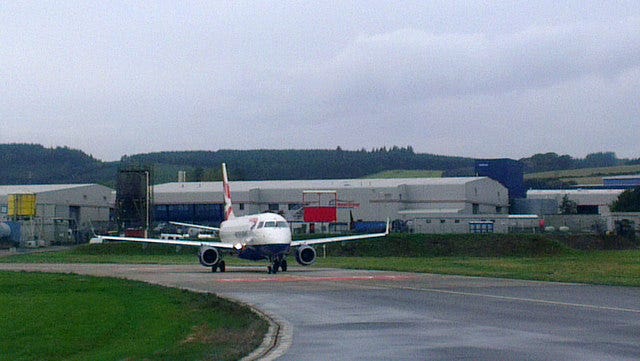 A plane awaits takeoff at Aberdeen airport