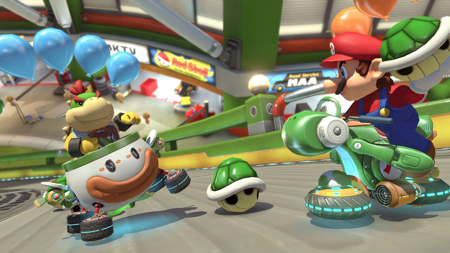 Bowser Jr. and Mario throwing green shells at each other in Mario Kart 8 Deluxe battle mode.