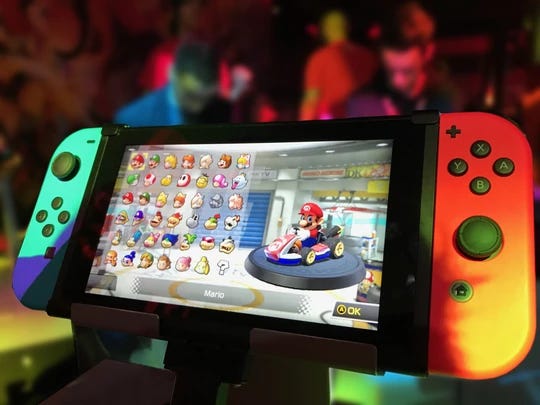 https://www.pexels.com/photo/turned-on-red-and-green-nintendo-switch-371924/