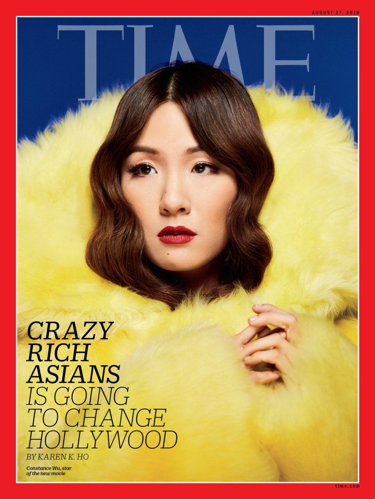 actress Constance Wu on the cover of TIME magazine in 2018 in a glamorous yellow fur coat and red lips