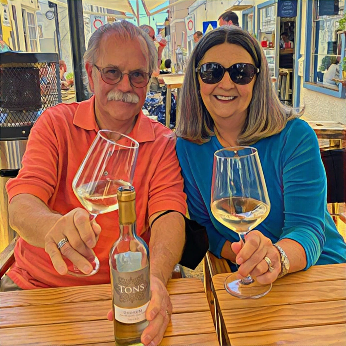 Man and woman with wine glasses