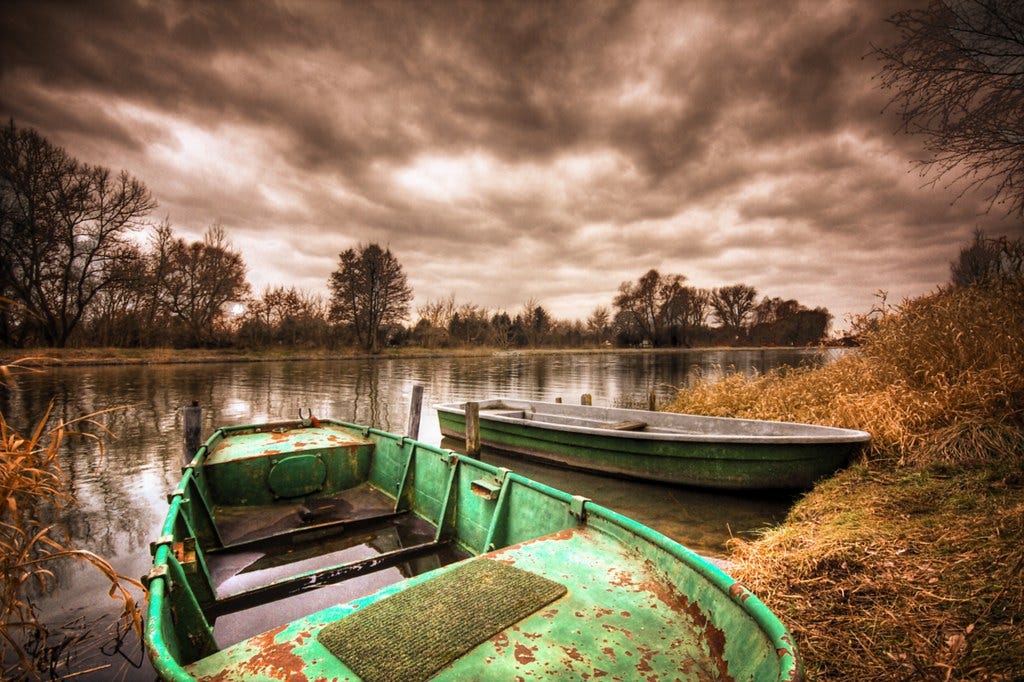 "green rowboat" by gari.baldi is licensed under CC BY-NC-ND 2.0 