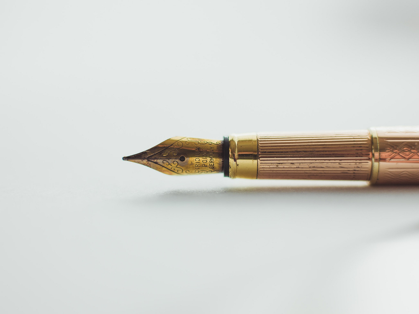 a pen on a white table