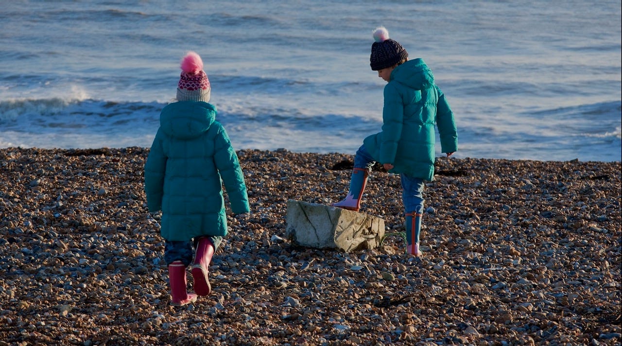 Two girls playing on Shoreham Beach