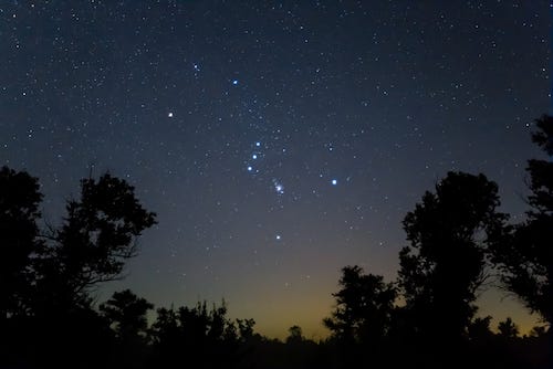 The Orion constellation in a night sky