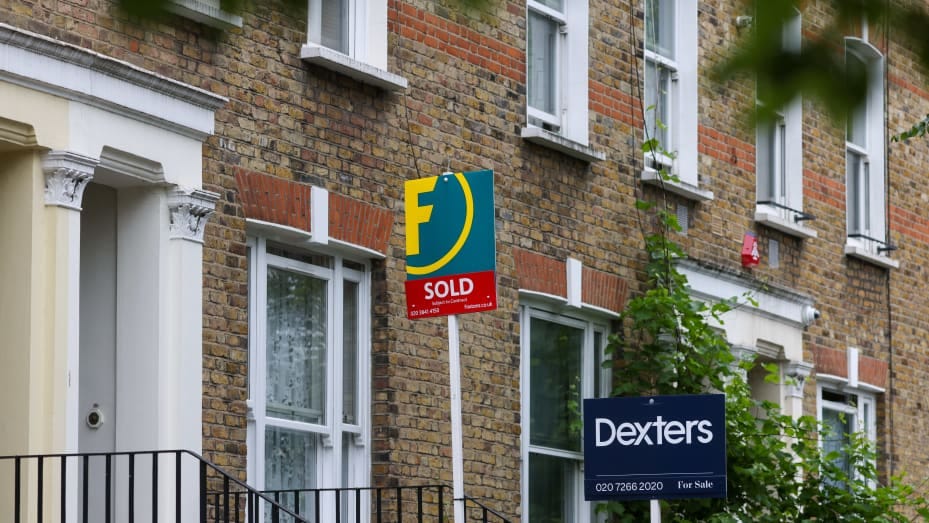 Estate agents "Sold" and "For Sale" signs outside residential properties in the Maida Vale district of London, UK, on Thursday, June 30, 2022.