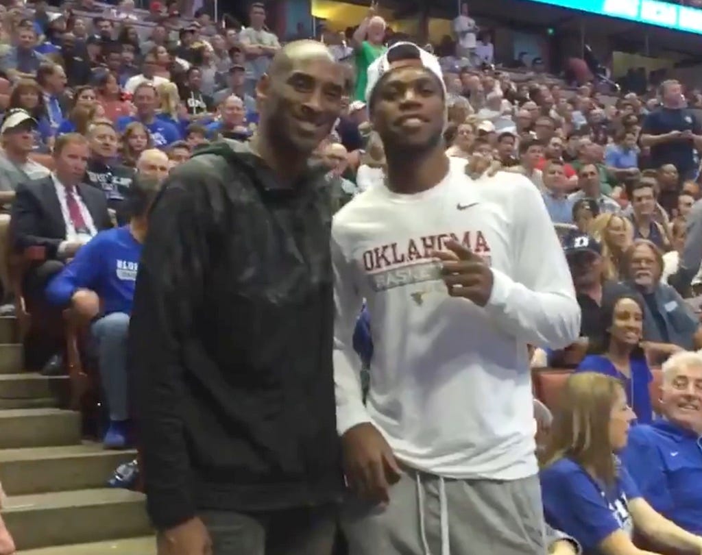 Buddy Hield gets a photo with his idol Kobe Bryant after an NCAA Tournament game in 2016.