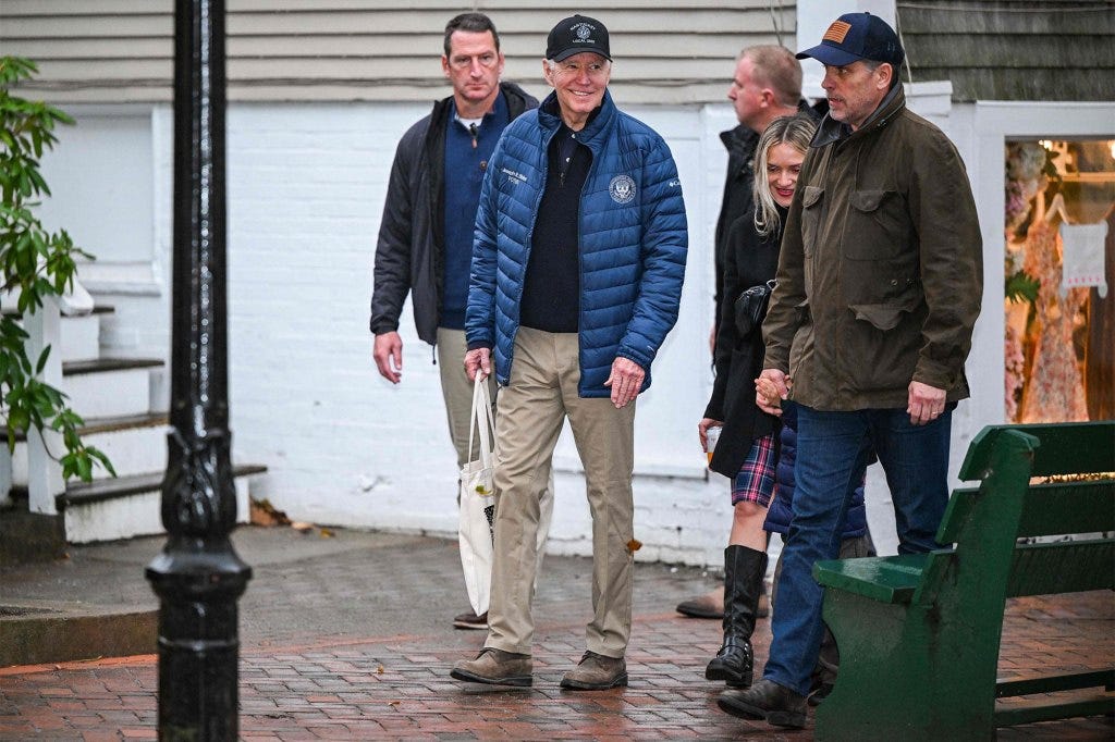 Joe Biden walks with Hunter Biden and his wife Melissa Cohen after having lunch in Nantucket, Massachusetts on Nov. 25, 2022.