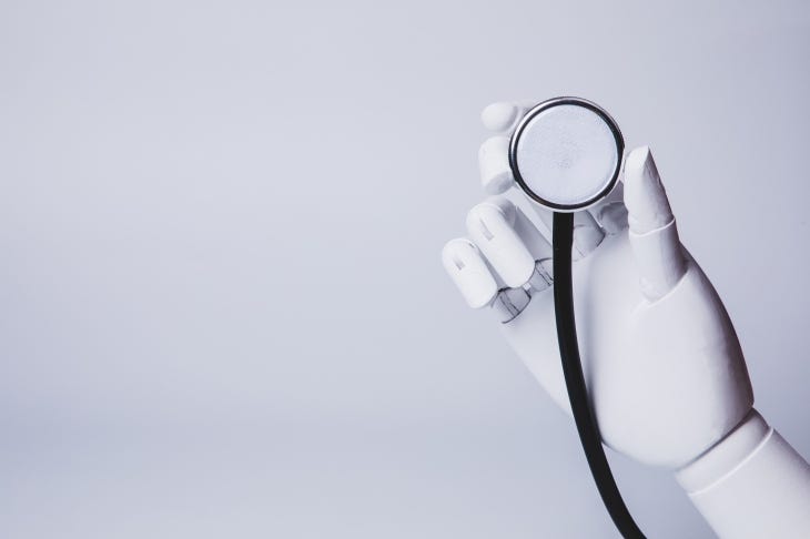 robotic hand holding stethoscope