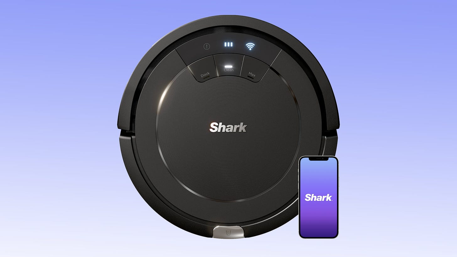 A Shark ION robot vacuum on a lavender gradient background