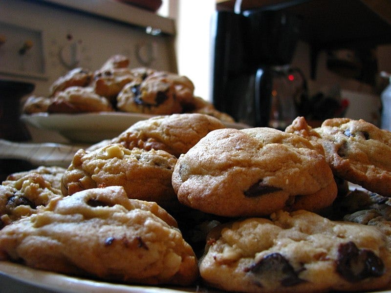 File:Plates of chocolate chip cookies with walnuts.jpg
