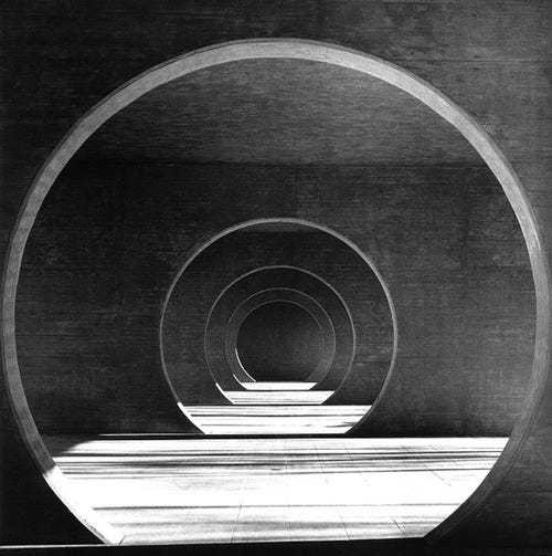 a series of concentric circles in grey scale that show tunnels progressing into the horizon