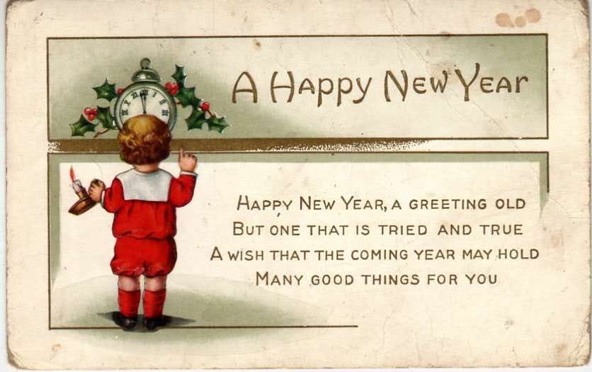 vintage happy new year card with a boy dressed in red, a lit candle, a clock, and holly wreath