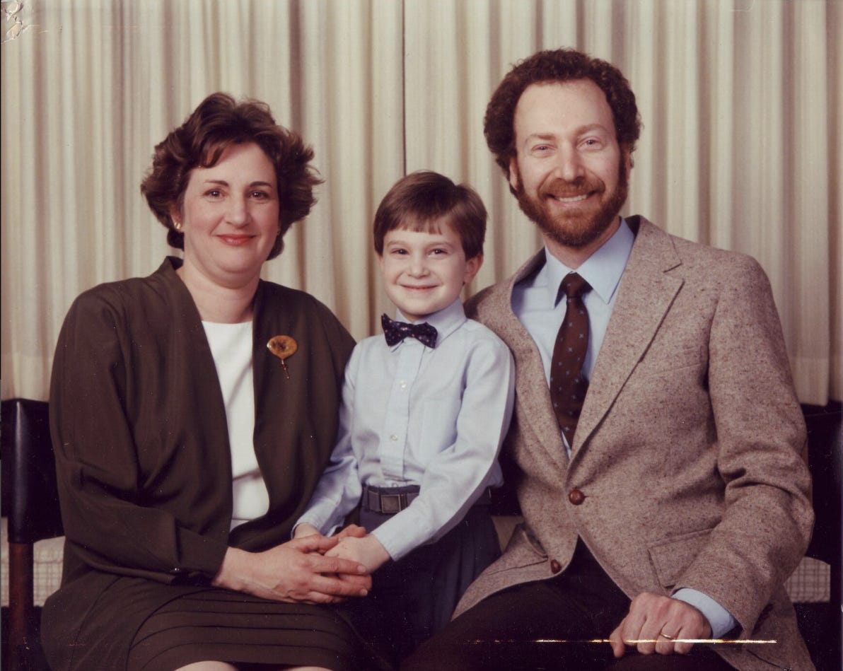 A photo of my mom, me, and my dad, in probably about 1993 or so. 