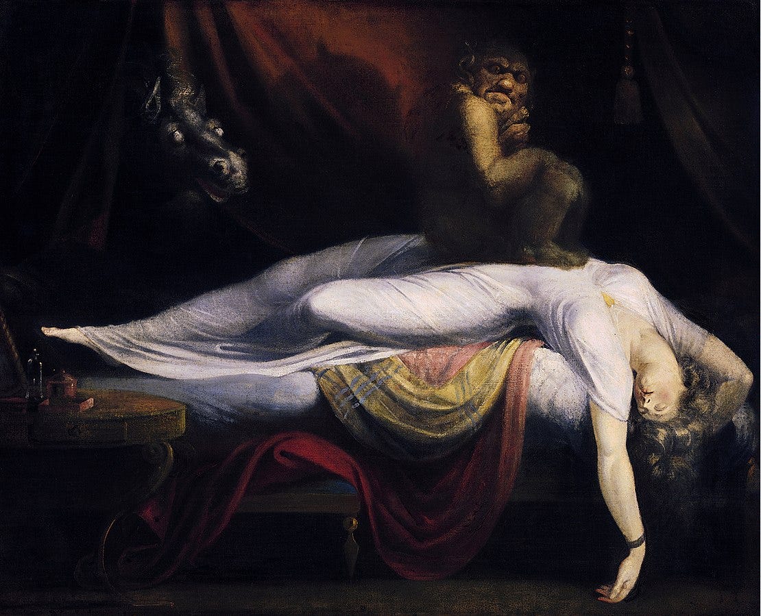 Painting of a woman bathed in white light stretches across a bed, her arms, neck, and head hanging off the end of the mattress. An apelike figure crouches on her chest while a horse with glowing eyes and flared nostrils emerges from the shadowy background