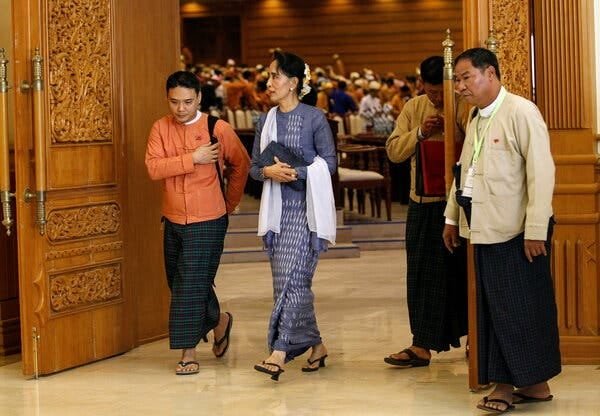 U Phyo Zeya Thaw, left, leaving Parliament with Daw Aung San Suu Kyi in Myanmar’s capital, Naypyidaw, in 2016. Mr. Phyo Zeya Thaw was one of four pro-democracy activists executed Saturday.