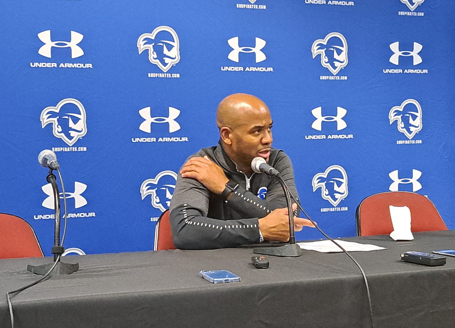 Seton Hall coach Shaheen Holloway speaks to reporters after beating Monmouth on Nov. 9, 2022. (Photo by Adam Zielonka)