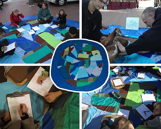 A composite image of four different participatory art events around a blanket called The World, a quilt top made of a giant blue circle with continents cut out from green and brown fabric. A top-down photo fo the blanket is at the center of the image, with four other images showing people interviewing and talking to each other while sitting in different public places while talking on that blanket.