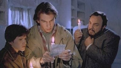 Sliders trying to figure out where they are by candlelight.