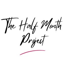 image: an icon of The Half Month Project. Created with handwritten type of font, with a dark pink curved line at the bottom.