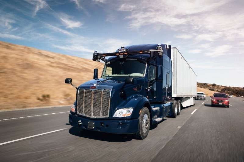 A self-driving truck produced by Aurora is seen on a road in Texas