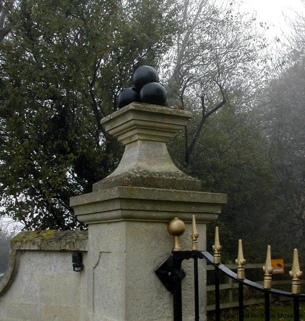 Midway Manor gate posts and the four cast balls representing Henry Shrapnel's exploding shells.
