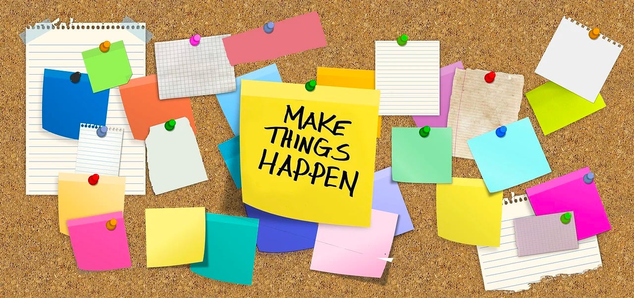 cartoon blank notes on cork board, center note labeled says make things happen